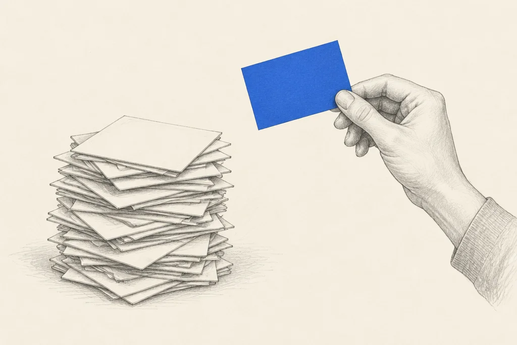 Hand drawn sketch: A hand lifting 1 blue card out of a tall untidy pile of blank cards