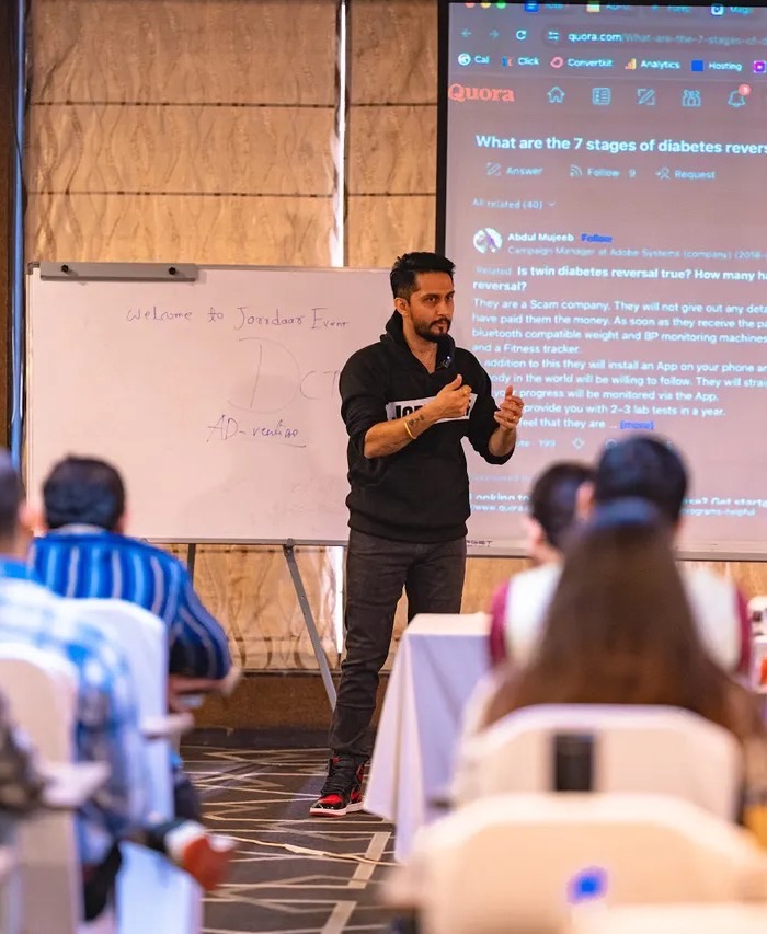 Digital Pratik teaching a room of founders, JorrDaar on his t-shirt